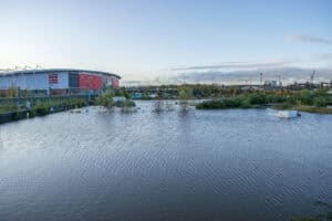 Floodwater covering land beside Rotherham United's New York Stadium, showing flood risk at football stadiums