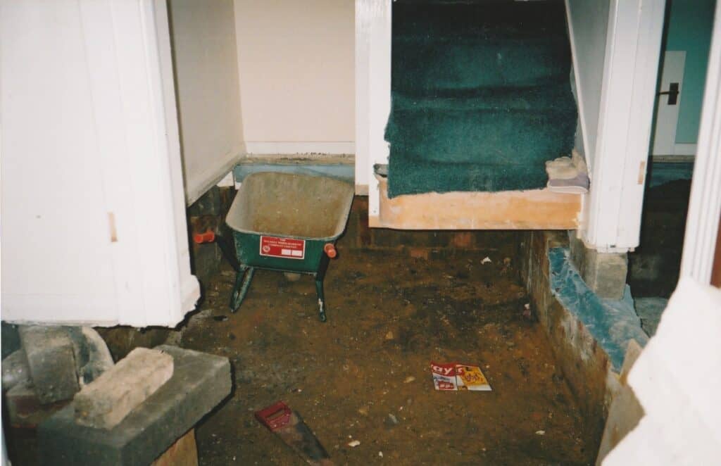 Building works begin to excavate the damaged foundations