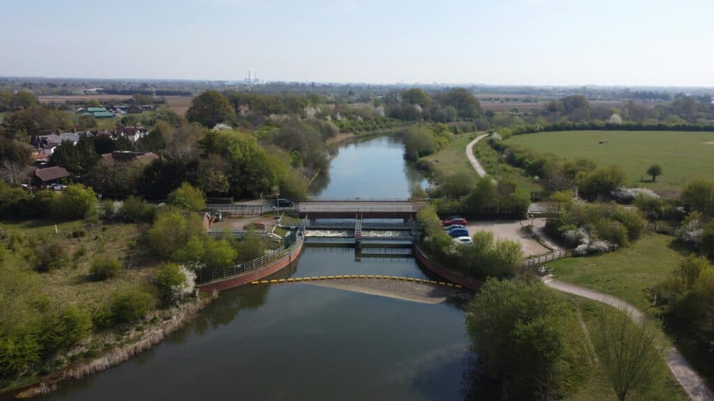 The Jubilee River running through open floodplain, with development on the far bank