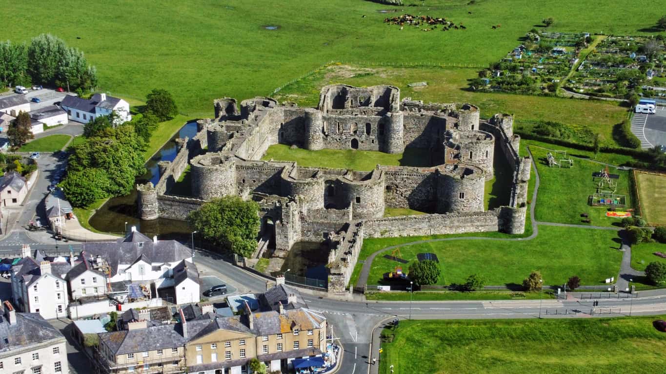 Aerial view of Beaumaris Castle and its surviving moat, where a medieval drainage scheme was designed to flush the latrines.