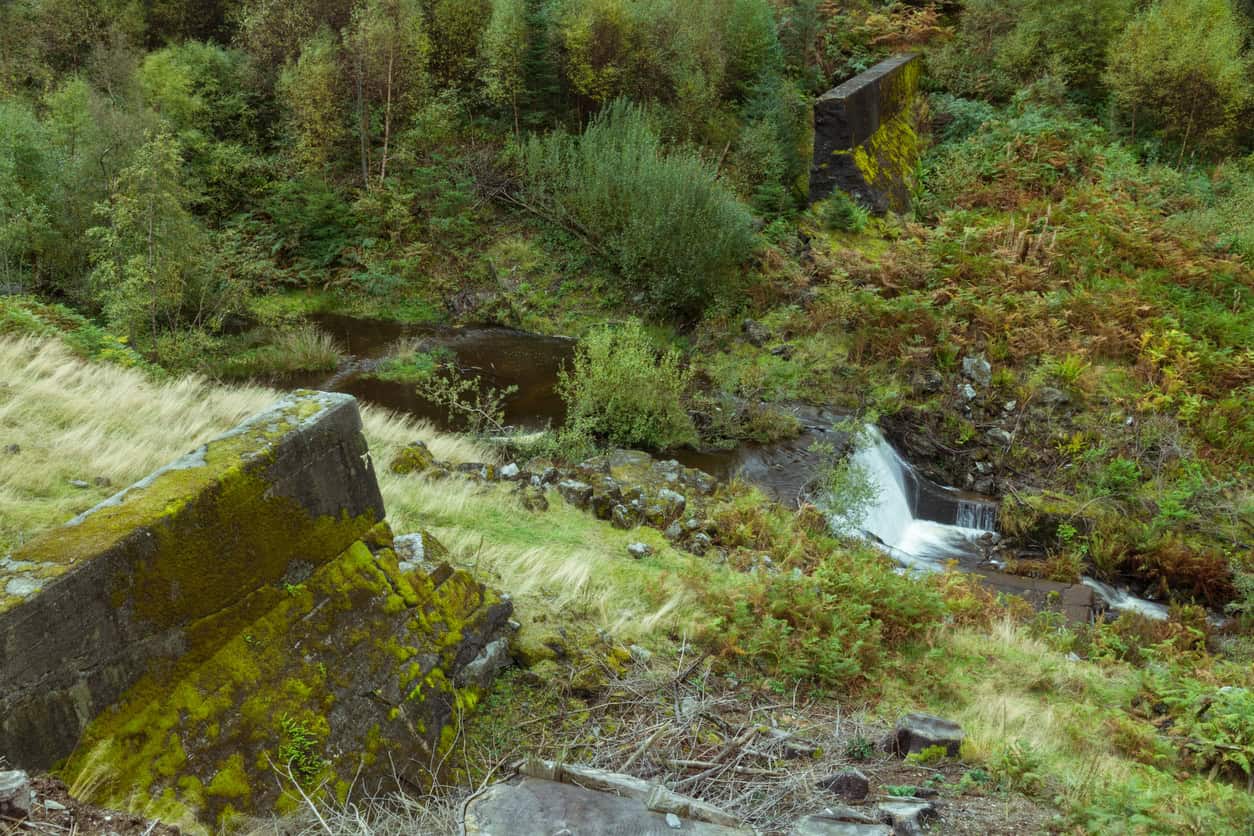 Breached remains of Nant-y-Gro Dam, Elan Valley, where a full-scale test did what breach modelling data now does.