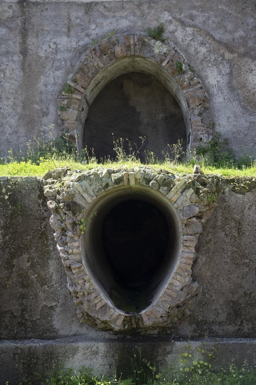 Egg-shaped Roman channel mouth at the Forum Romanum in Rome, the city where most searches for the oldest drainage system in the world stop.
